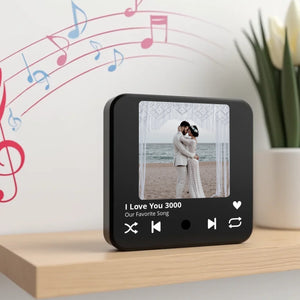 create_a_photorealistic_image_of_a_sleek_black_magnet_positioned_frontally_on_a_light_wooden_shelf__qw5rwqeuevuqkgdqfpyw_0