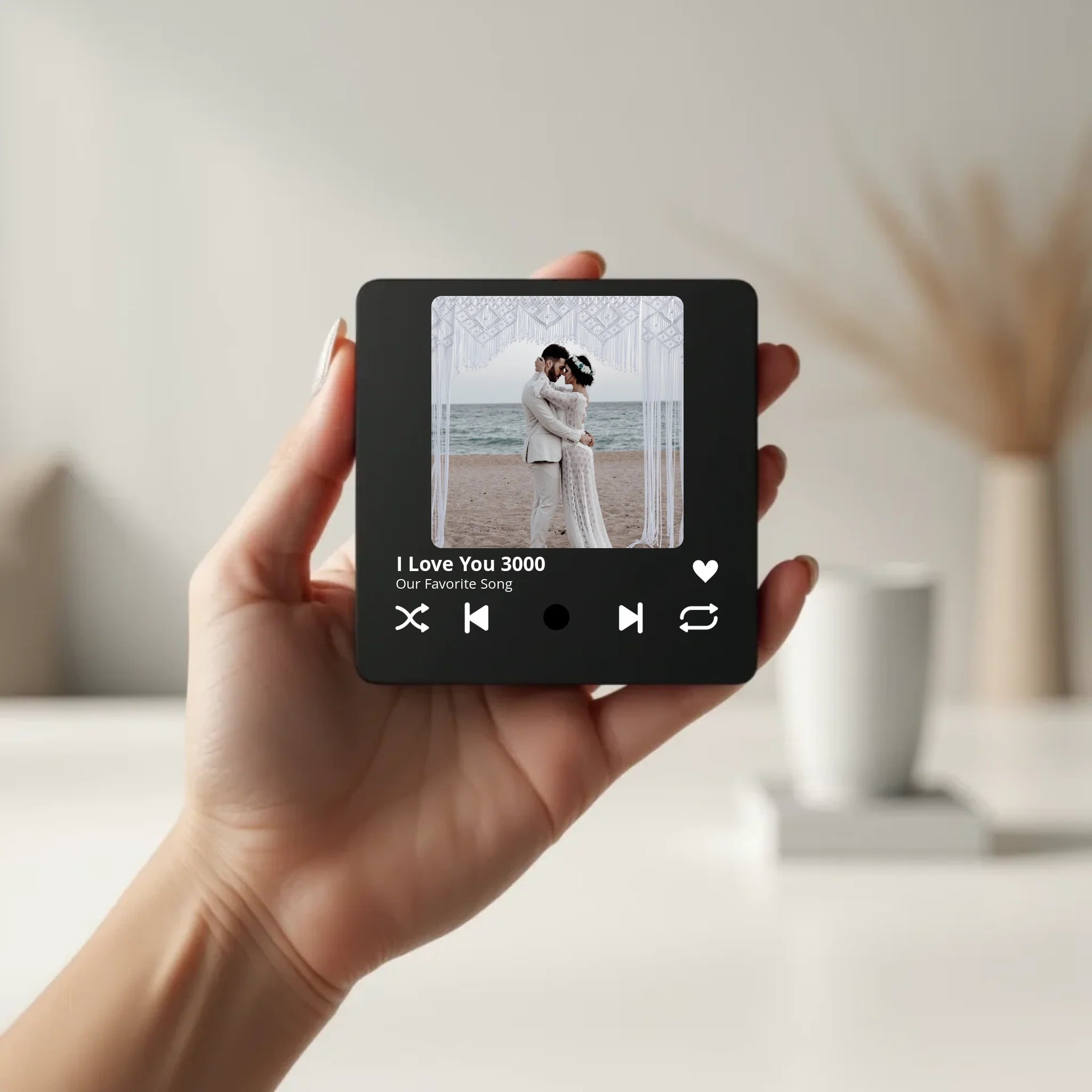 create_a_photorealistic_image_of_a_black_square_magnet_being_held_delicately_between_the_fingers_of_qqw3nm39rssethtggy4u_3