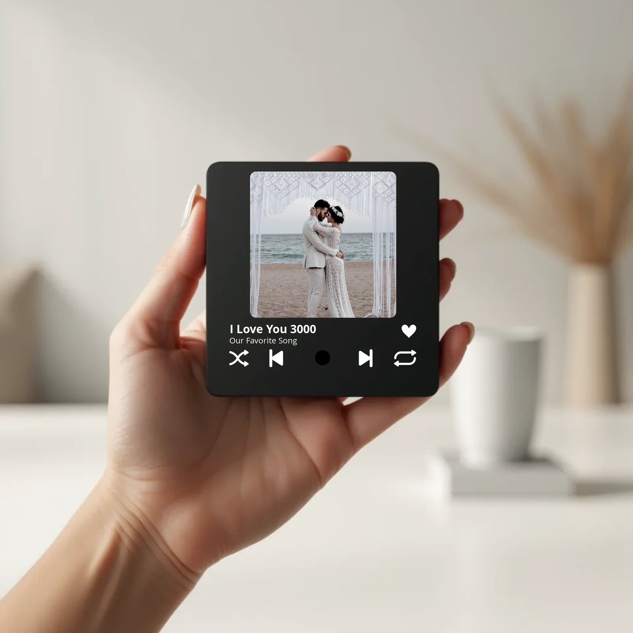create_a_photorealistic_image_of_a_black_square_magnet_being_held_delicately_between_the_fingers_of_qqw3nm39rssethtggy4u_3