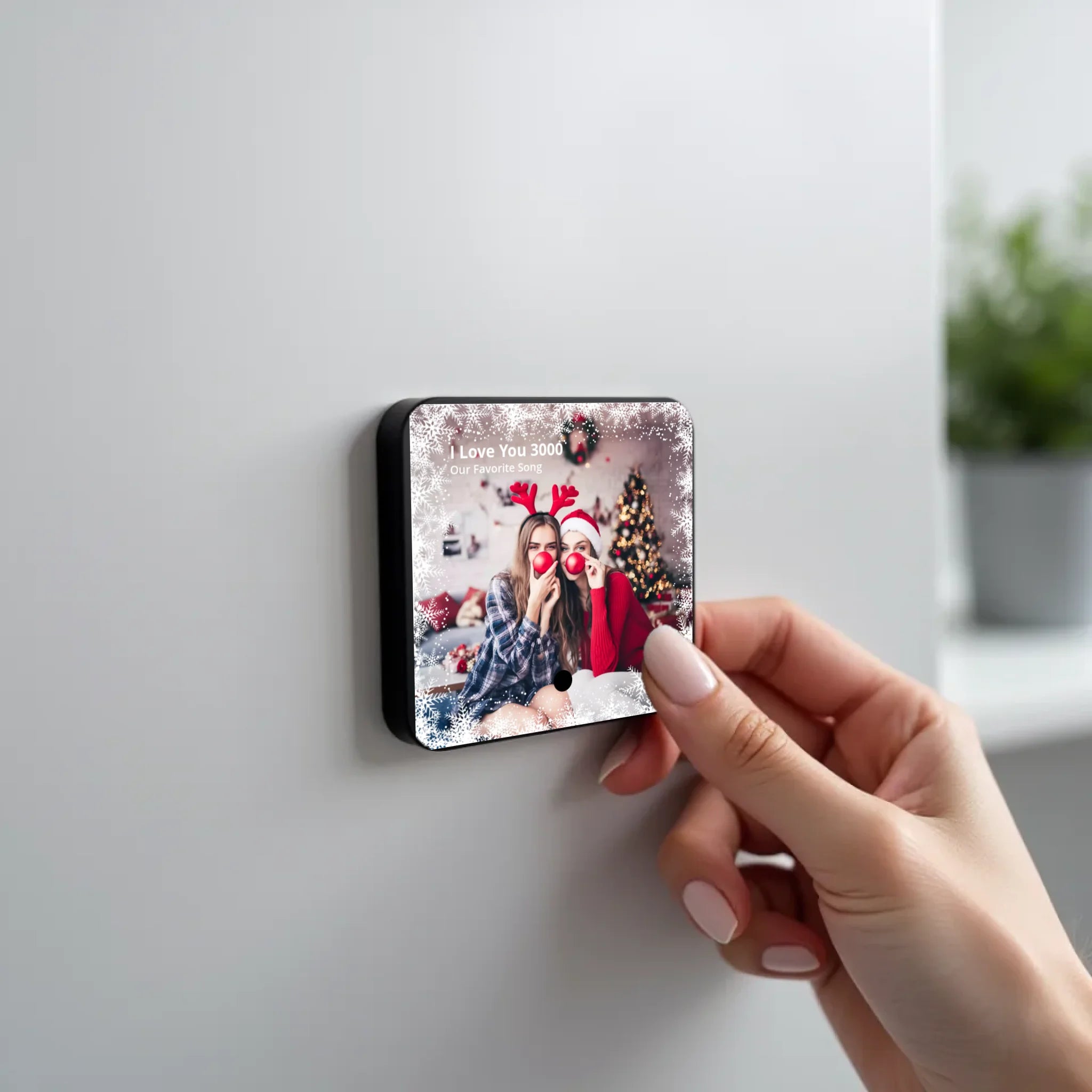 create_a_photorealistic_image_of_a_black_square_magnet_being_held_delicately_between_the_fingers_of_u5ld8if38hkpw8a2q0ny_1