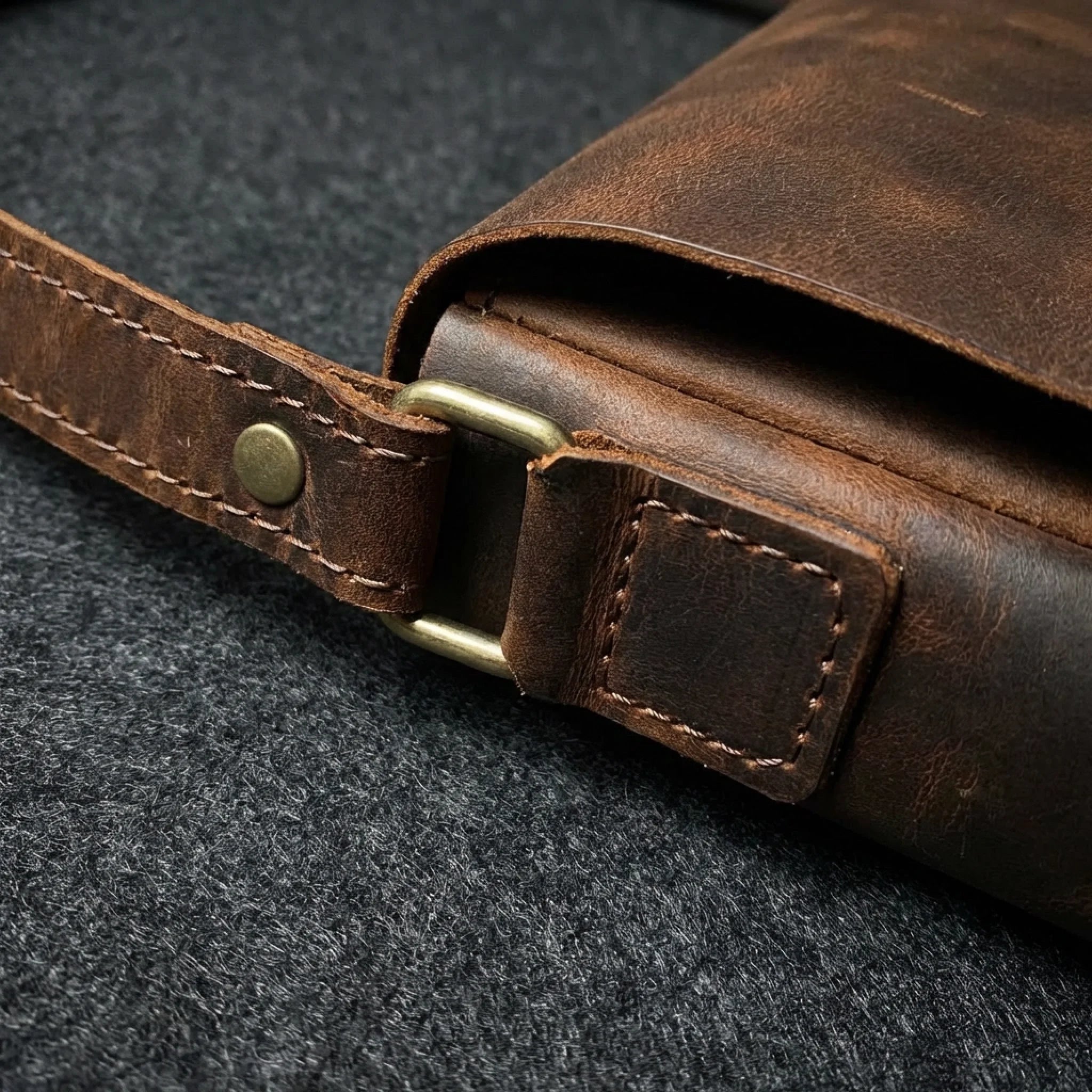 enhance_this_close-up_of_the_crazy_horse_leather_strap_attachment_point_to_create_a_premium_artisan_mhm8cn4fqionnola00qb